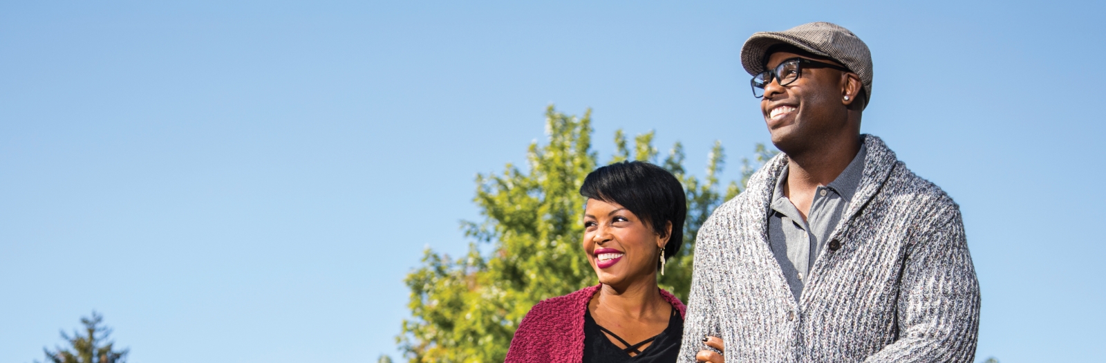 Image of WPCU members Jalonda and Joey H., Members Since 2017, springy blue sky