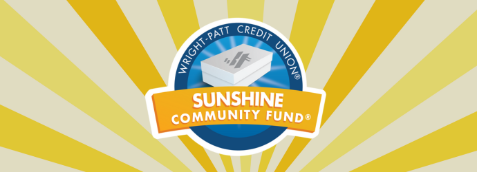 WPCU Sunshine Community Fund Logo with sun rays in background