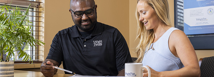 a WPCU partner helping a WPCU member